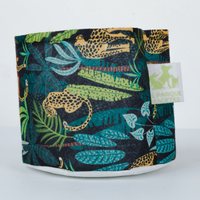 Ver: Maceta sublimada de leopardos con la etiqueta de la marca