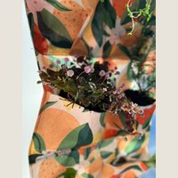 Ver: Detalle de la tela estampada de naranjas